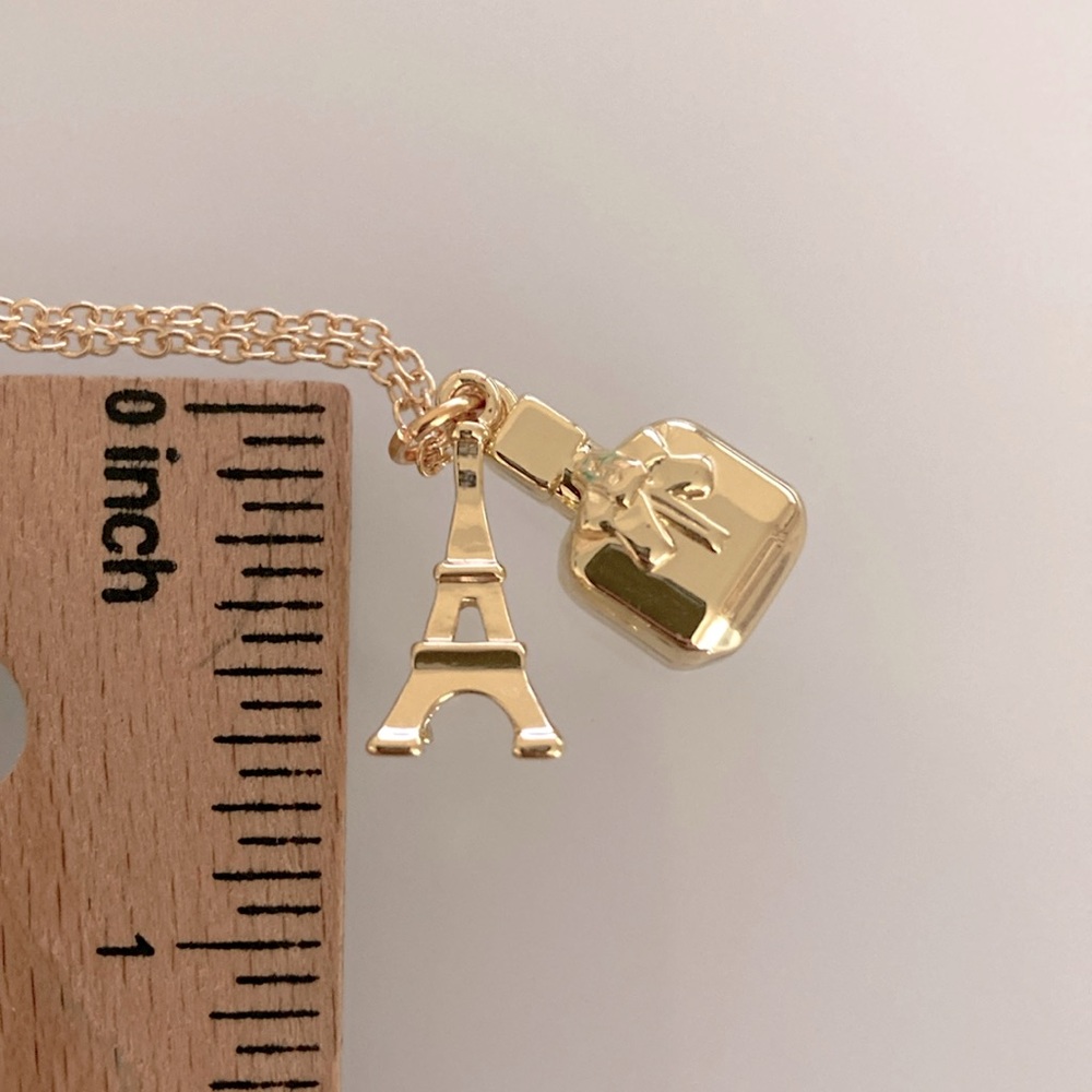 Yves Saint Laurent Gold Eiffel Tower and Perfume Bottle Necklace - Picture 5 of 5
